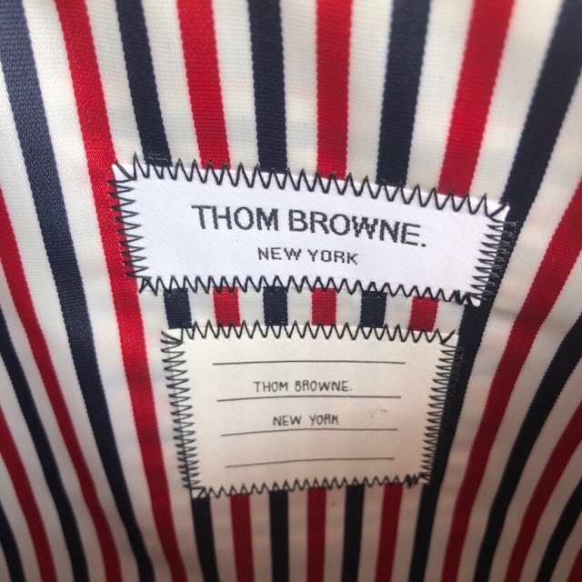 톰브라운 THOMBROWNE 남여공용 클러치백 TW147