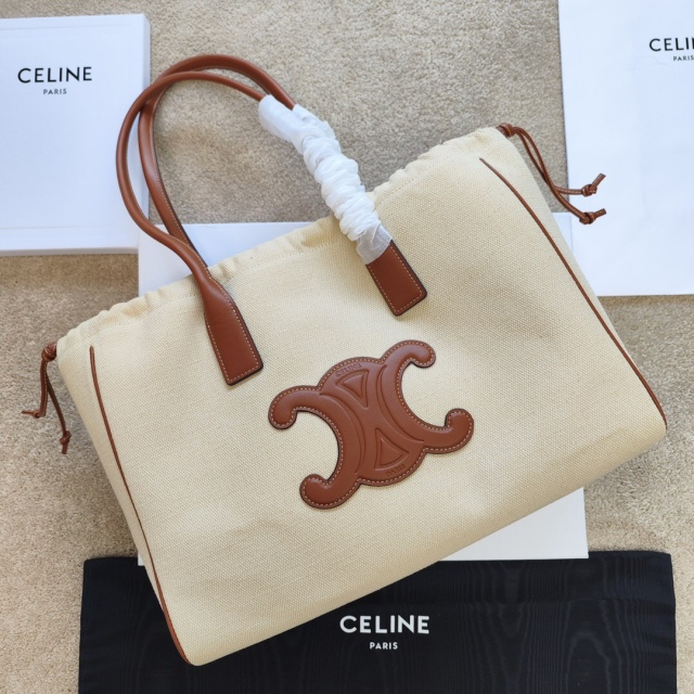 셀린느 CELINE 퀴르 트리옹프 드로우스트링 카바스 199973  CL0562